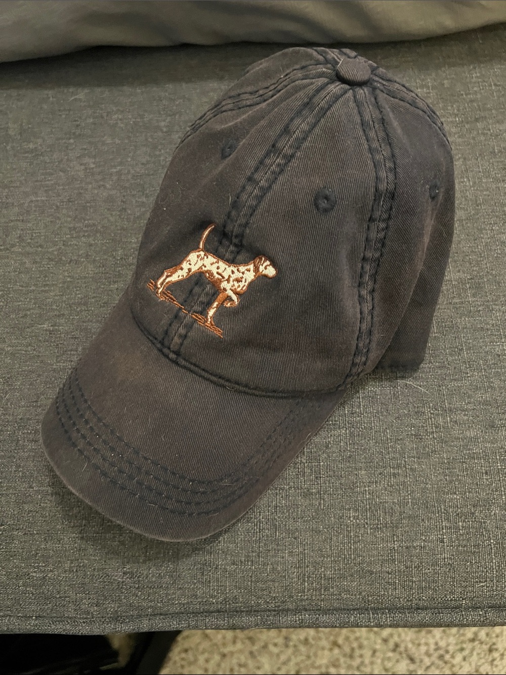 Navy Blue Baseball Cap with Embroidered Dog Accent